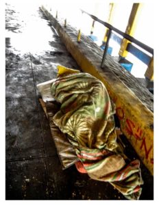 man-sleeping-under-bridge-640